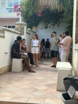 Gateway GSE English school St Julians Adult students relaxing on the school patio